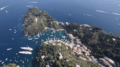 High angle view of townscape by sea