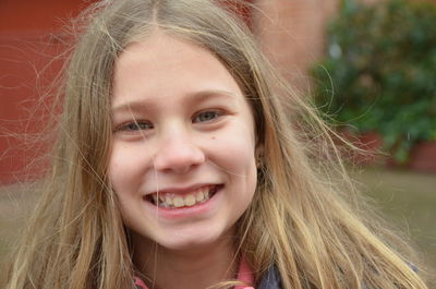 Close-up portrait of smiling girl