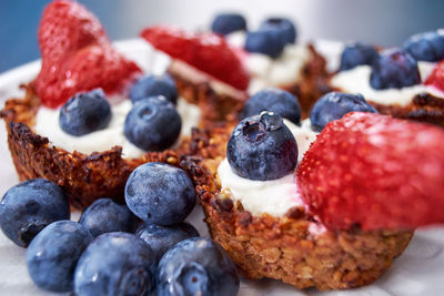 Close-up of tart and berries on table