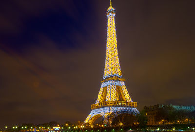 Low angle view of eiffel tower at night