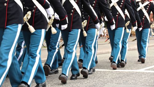 Low section of military walking on street