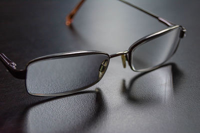 Close-up of eyeglasses on table