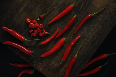 High angle view of red chili peppers on table