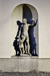 Statue against wall in building