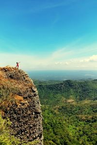 Man looking at sea against sky