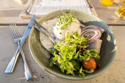 High angle view of salad in bowl on table