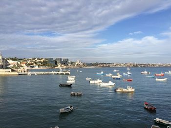 High angle view of sailboats in sea against sky