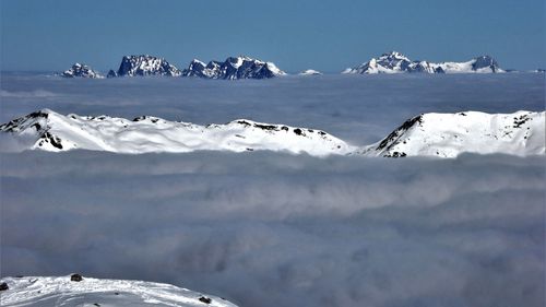 Fog covers the valley.  view over the valais alps. 