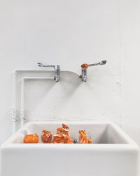 View of orange peel in a sink. quite arty and gritty
