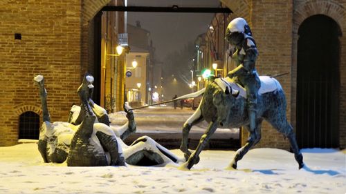 Horses in illuminated at night