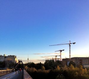 Windmills against clear blue sky