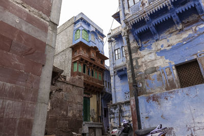 Low angle view of old building against sky