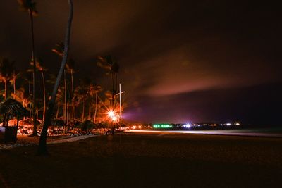 View of illuminated tunnel at night