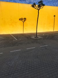 Yellow umbrella on sand