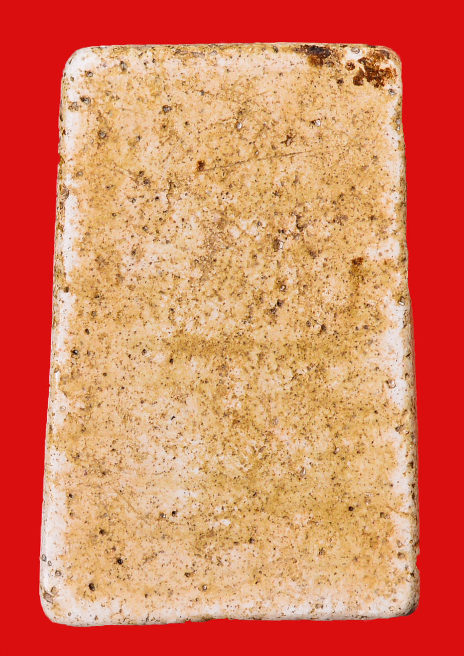 DIRECTLY ABOVE SHOT OF BREAD ON RED BACKGROUND