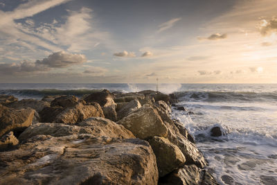 Southbourne dorset, boulder sea defence with waves, landscape