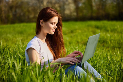 Young woman using mobile phone