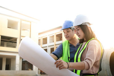 Young man working on construction site