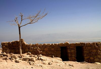 Scenic view of desert against clear sky