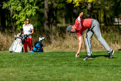 Couple on a golfing vacation, beautiful sunny weather