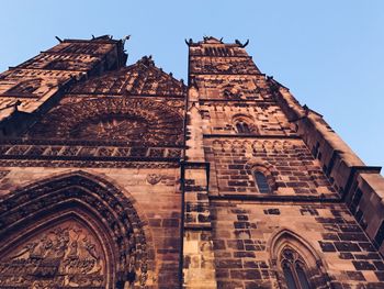 Low angle view of historical building against clear sky
