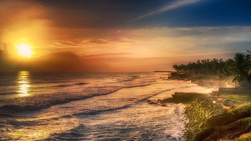 Scenic view of sea against sky during sunset