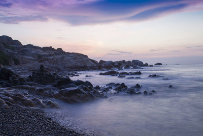 Scenic view of sea against sky during sunrise