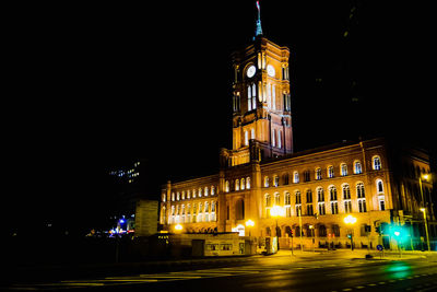 Low angle view of illuminated building at night