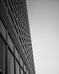 Low angle view of modern building against clear sky