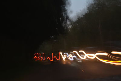 Close-up of illuminated text at night