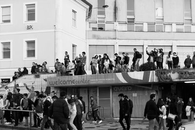 Group of people in front of building