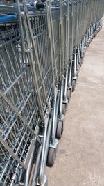 High angle view of shopping cart in row