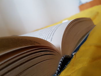 Close-up of open book on table