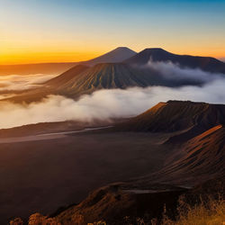 Dawn over the snow capped mountains. snowy mountain peak at dawn. sunrise in mountains.