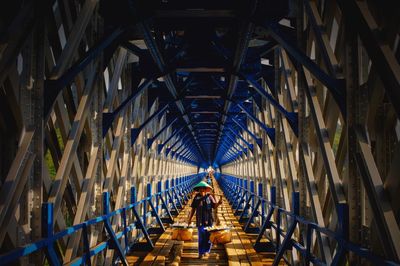 People walking on footbridge