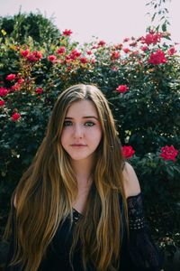 Close-up portrait of smiling young woman
