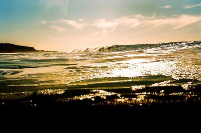 Scenic view of sea at sunset