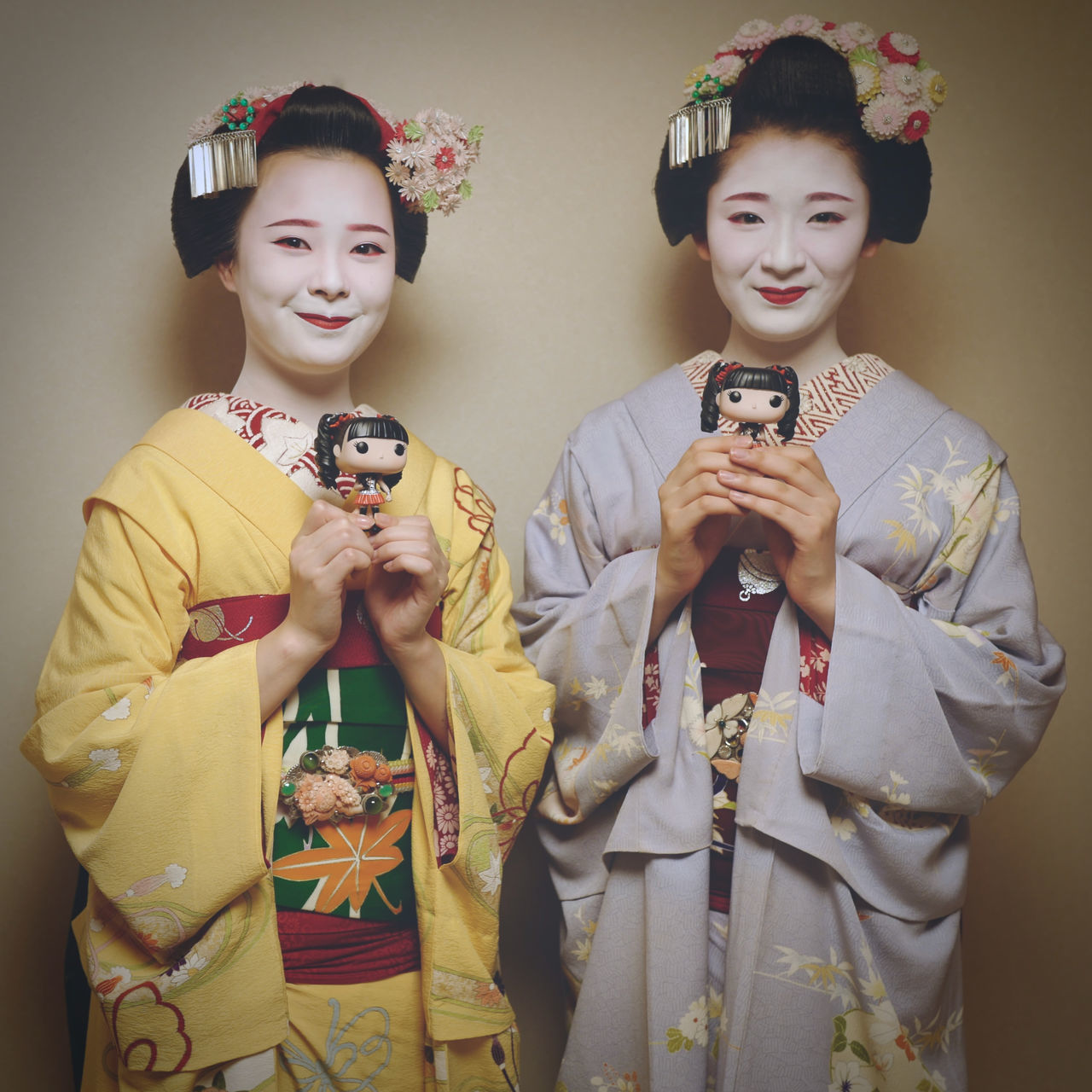 culture, female, two people, portrait, women, clothing, adult, indoors, kimono, studio shot, person, smiling, holding, togetherness, traditional clothing, looking at camera, costume, child, young adult, waist up, childhood, robe, emotion, front view, happiness, standing, men, celebration, friendship, flower, fashion accessory