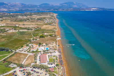 High angle view of sea and cityscape