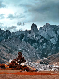 Scenic view of snowcapped mountains against sky