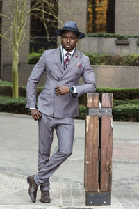 Portrait of young man standing outdoors