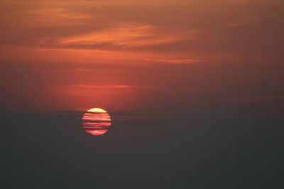 Scenic view of sea against romantic sky at sunset