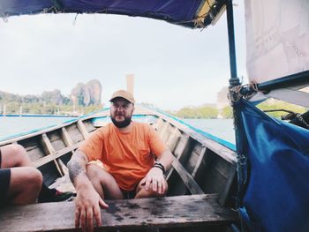 Portrait of man sitting in boat