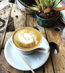 High angle view of cappuccino on table