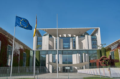 Low angle view of building against clear blue sky