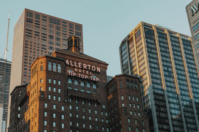 Low angle view of skyscrapers against sky