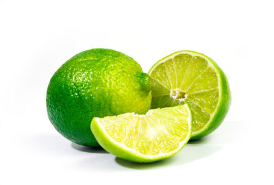 Close-up of fruits against white background