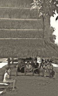 Group of people sitting on floor