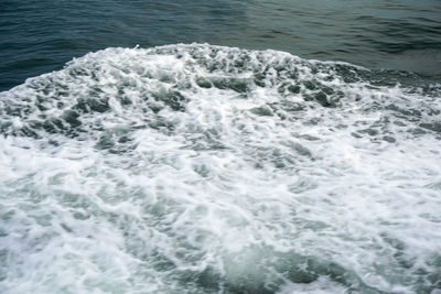 High angle view of waves in sea