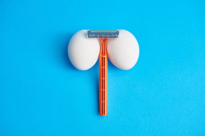 Directly above shot of equipment against blue background
